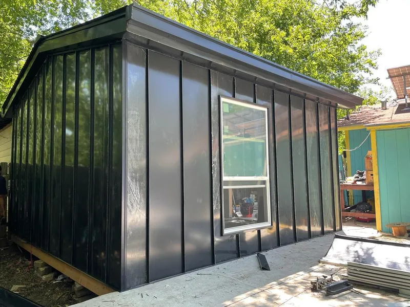 Black standing seam metal wall panels for Metal Roof Installation in Emporia