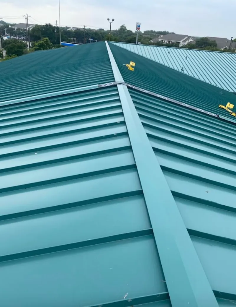 Green commercial metal roof ridge and valley for Metal Roof Repair in Emporia